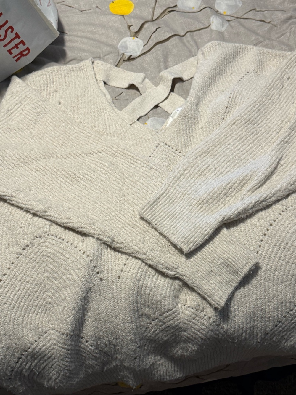 V-Neck Cream Knit Sweater with Back Strap Detail